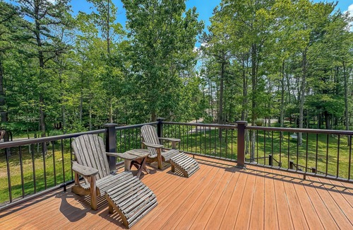Swanton House | Amazing Outdoor Amenities: Tons of Seating, Dock, Hot Tub, Fire Pit + More