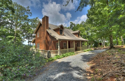 Talking Rock Cabin | Amber Sunsets dazzles with panoramic views, hot tub luxury, a custom firepit, screened porch, pool table, and pet-friendly hospitality!