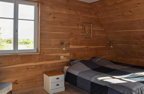 Mittelbergheim House | Amidst vines, hills and forests welcomes you this modern vacation home with pool.