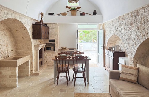 Valenzano House | Ancient Trullo surrounded by greenery in the heart of Valle D'Itria