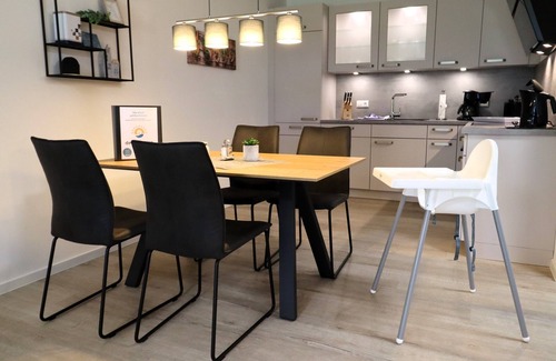 Dorumer Neufeld Apartment | Ankerpunkt Südost - Ferienwohnung mit Garten und Sauna