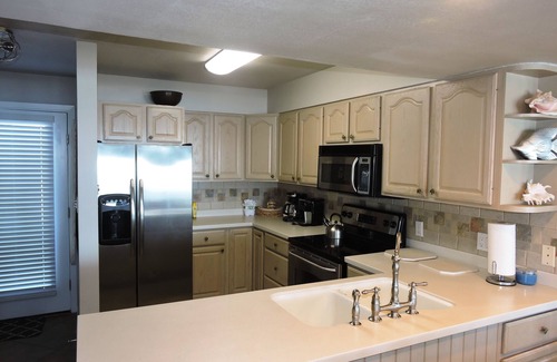 Miramar Beach House | Any Closer to the Beach, You'd Have Sand in Your Sheets! August Specials