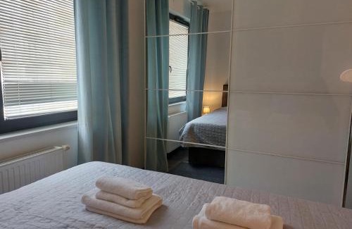 Wola Apartment | Apartament JK 47 A z miejscem postojowym w garażu