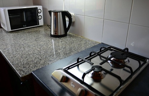 Tortella House | Apartamento 8 personas 4 habitaciones y cuatro baños. Piscina COMPARTIDA.