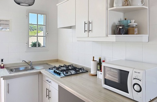 Arenal d'en Castell Apartment | Apartamento con Piscina y Solarium
