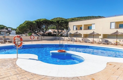 Los Canos de Meca Apartment | Apartamento con piscina y garaje en los Caños de Meca.