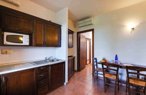 Orbetello Condo | Apartement with air conditioning and outdoor pool