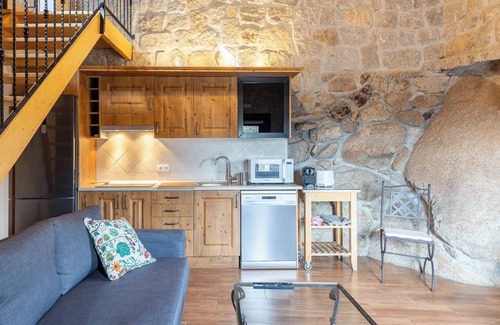 Fresnedillas de la Oliva Apartment | Apartment 'Casa De Piedra' with Shared Pool, Private Terrace and Wi-Fi