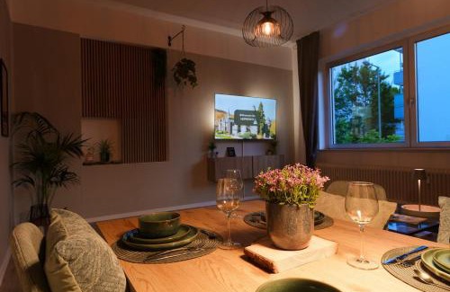 Vorderer Westen Apartment | Apartment am Tannenwäldchen im Vorderer Westen Kassel by CASTORA HOMES