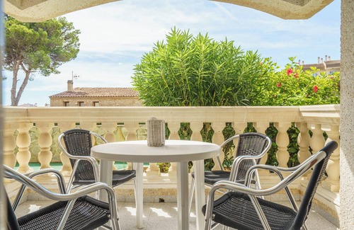 Cala Agulla Apartment | Apartment 'Apartamento Flora' with Shared Pool, Private Terrace and Wi-Fi