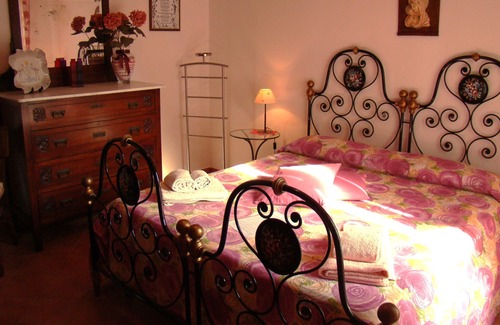 Capoliveri Apartment | Apartment 'Appartamento Zizzolo' with Private Terrace, Private Garden and Wi-Fi