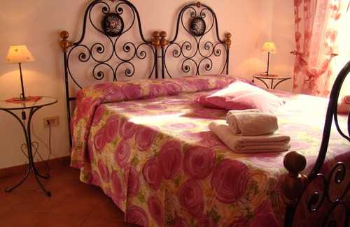 Capoliveri Apartment | Apartment 'Appartamento Zizzolo' with Private Terrace, Private Garden and Wi-Fi