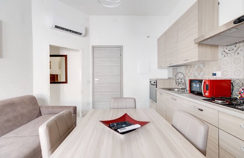 Bosa Historic Centre Apartment | Apartment 'Appartamento A' with Wi-Fi and Air Conditioning