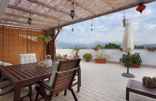 Viareggio Apartment | Apartment 'Attico Con Terrazza A Viareggio' with Mountain View, Shared Terrace and Air Conditioning