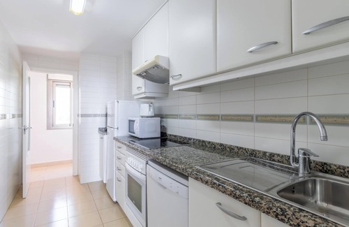 Calpe Apartment | Apartment "Bahia del Sol" with Sea View, Pool, Wi-Fi, A/C, Terrace & Garden