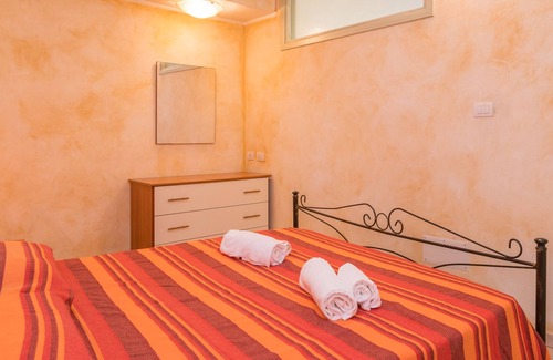 Barrabisa Apartment | Apartment 'Barrabisa Bilocale Grazioso' with Private Terrace and Air Conditioning