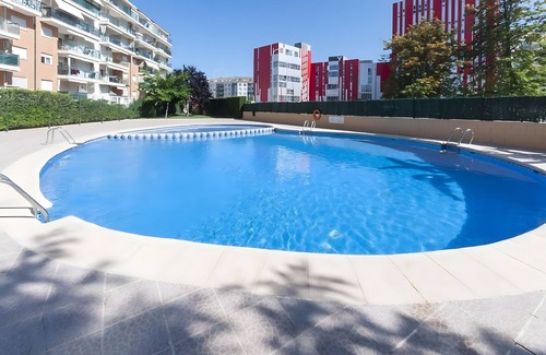 Grao de Gandia Apartment | Apartment 'Calma Mar' with Shared Pool, Wi-Fi and Air Conditioning
