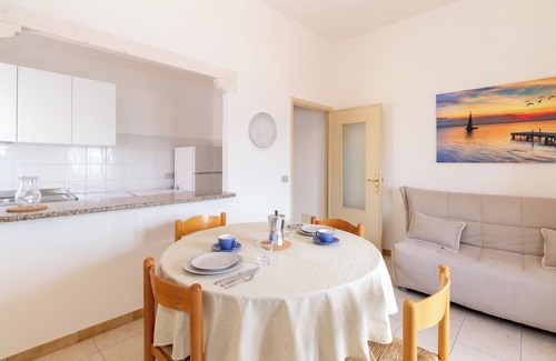 Trinita d'Agultu e Vignola Apartment | Apartment "Casa Spiaggia Molo 2" on Isola Rossa with Sea view & Balcony