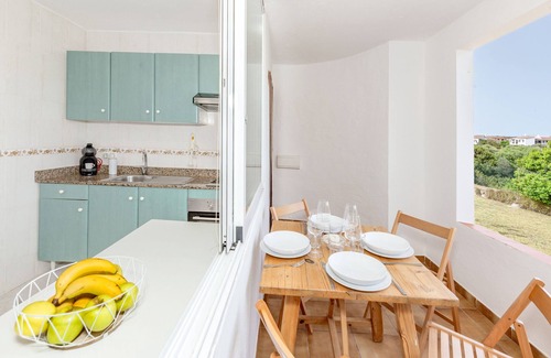 Los Delfines Apartment | Apartment 'De Playa En Ciutadella' with Shared Pool, Shared Garden and Wi-Fi