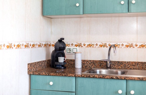 Los Delfines Apartment | Apartment 'De Playa En Ciutadella' with Shared Pool, Shared Garden and Wi-Fi