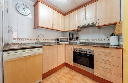Sant Carles de la Rapita Apartment | Apartment 'Edificio Simancas' Balcony and Air Conditioning
