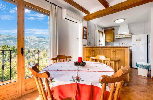 Orba Apartment | Apartment 'El Castellet' with Mountain View, Wi-Fi and Air Conditioning