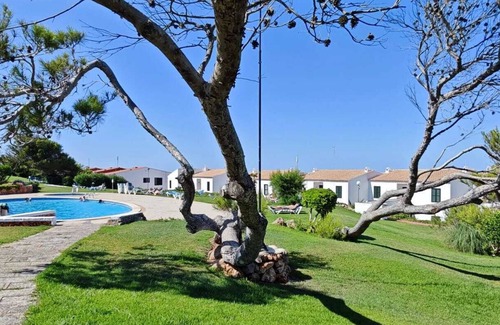 Arenal d'en Castell Apartment | Apartment with beautiful sea views, gardens, swimming pool and very well located.