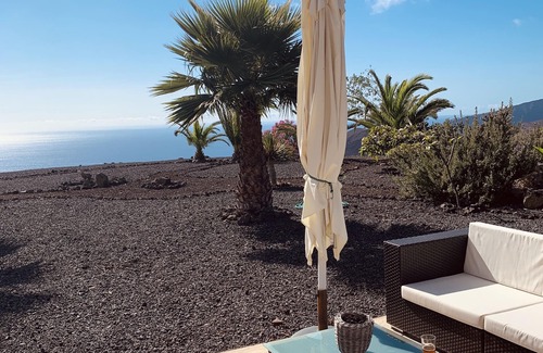 Los Llanos de Aridane Apartment | Apartment "Fenia" surrounded by natural lava fields with sea and mountain view