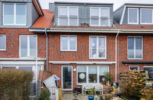 Norderney House | Apartment 'Ferienhaus Raschke' with Sea View, Private Terrace and Wi-Fi