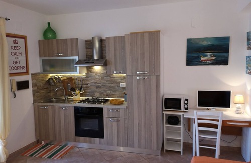 Cefalu Apartment | Apartment in a residence with swimming pool overlooking the sea useful for families with children