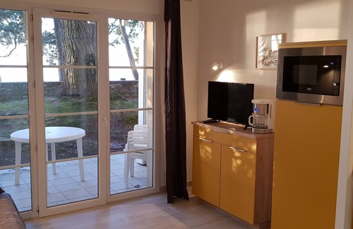 Fouesnant Apartment | Apartment in luxury residence with pool facing the sea