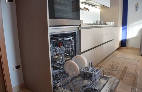 Sant'Anna Apartment | Apartment in residence a few steps from the beach and with a condominium pool