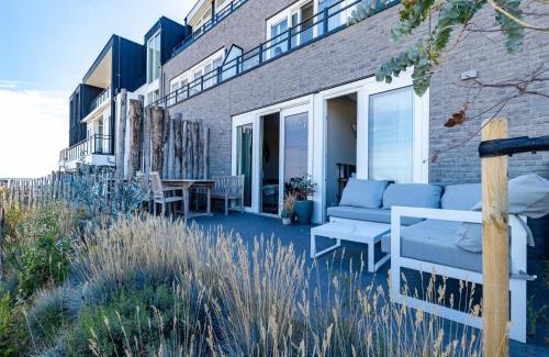 Sint-Annaland Apartment | Apartment in Sint-Annaland with Beach Access