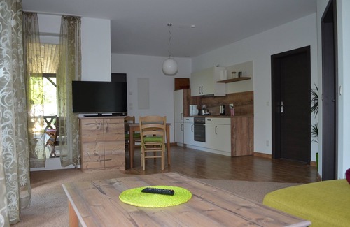 Burg-Dorf Apartment | Apartment Kahnschuppen - Spreewaldscheune am Fließ-Ferienwohnungen am Wasser in