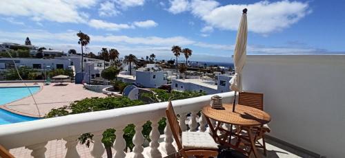 Los Mojones Apartment | Apartment Paraiso III - Pool & Sea view - good Wifi- Residence Loma Verde