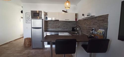 Los Mojones Apartment | Apartment Paraiso III - Pool & Sea view - good Wifi- Residence Loma Verde