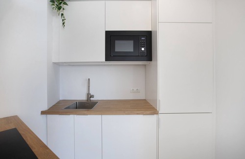 Torremolinos City Centre Apartment | Apartment 'Plata Ático' with Private Terrace, Balcony and Air Conditioning