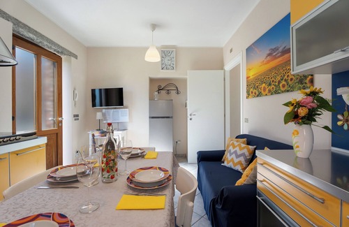 Comero Apartment | Apartment 'Res Jasmine- Appartamento Yellow' with Mountain View, Shared Garden and Wi-Fi