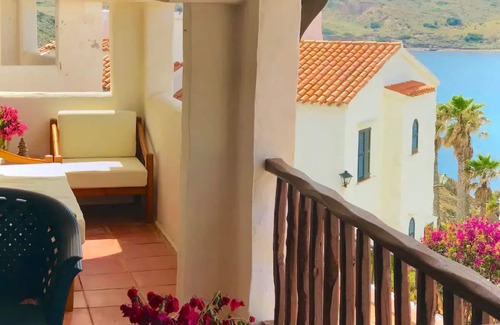 Platges de Fornells Apartment | Apartment 'Sacalma' with Shared Pool, Wi-Fi and Air Conditioning