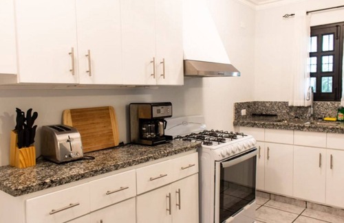 Cabarete Apartment | Apartment steps from a quiet surfing beach, pool/TV/Wi-fi/AC