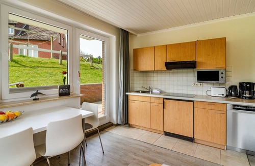 Baltrum Apartment | Apartment 'Strandhus Uiterst-hörn Backbord' with Sea View, Garden & Wi-Fi