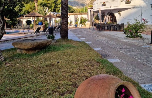 La Canuta Apartment | Apartment 'Sunsea Village V' with Mountain View, Shared Pool and Private Terrace