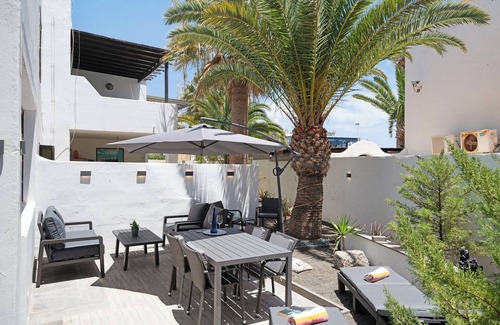 Puerto del Carmen Apartment | Apartment 'Tranquilidad 300m To Beach' with Private Terrace, Shared Garden and Wi-Fi