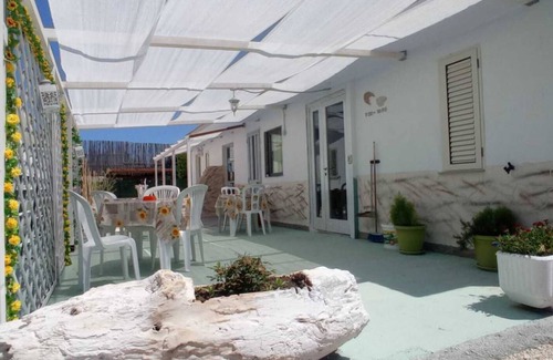 Peschici Apartment | Apartment 'Trilo 1' with Private Terrace, Shared Garden and Wi-Fi