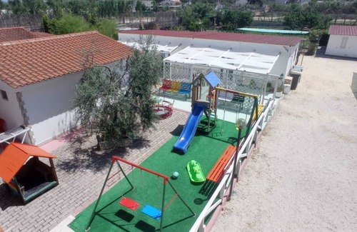 Peschici Apartment | Apartment 'Trilo 1' with Private Terrace, Shared Garden and Wi-Fi