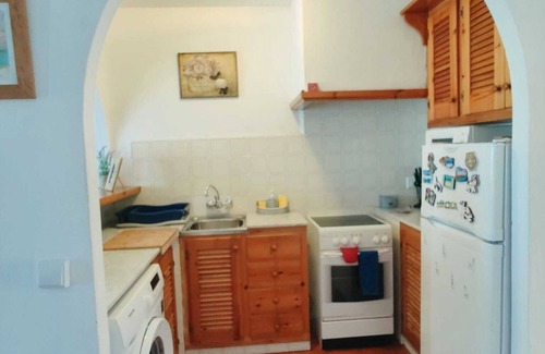 Arenal d'en Castell Apartment | Apartment with Private Pool, Garden and Sea Views