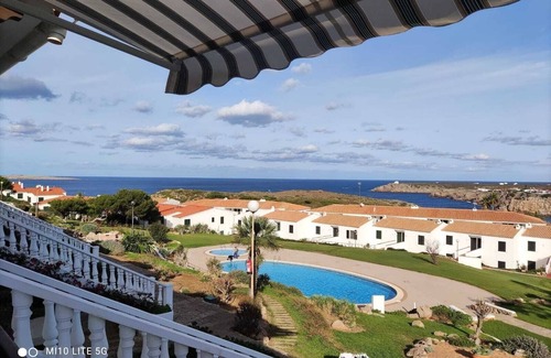 Arenal d'en Castell Apartment | Apartment with Private Pool, Garden and Sea Views
