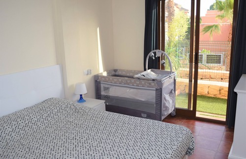 Los Puertos Condo | Apartment with large garden and air conditioning