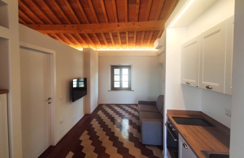Peccioli Apartment | Apartment with large panoramic terrace in the center of the village.