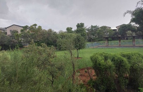 Greater Johannesburg Metropolitan Area Apartment | Apartment with Lush green garden and a Pool